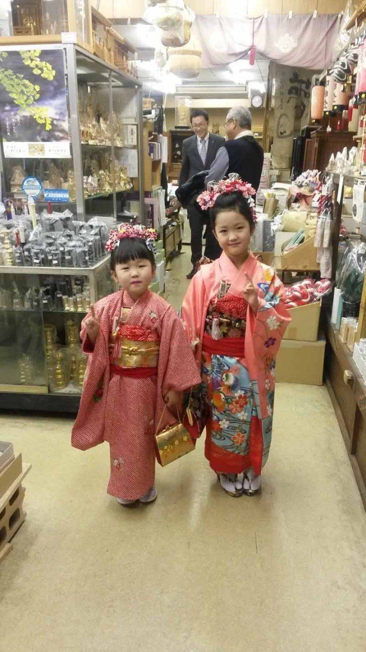 Girls wearing kimonos in store in Fukuoka