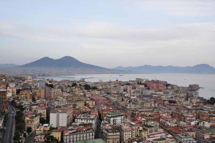 The city of Naples in Italy, with Mount Vesuvius in the background