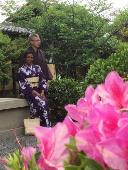 Enjoying the gardens of Kyoto in traditional garb