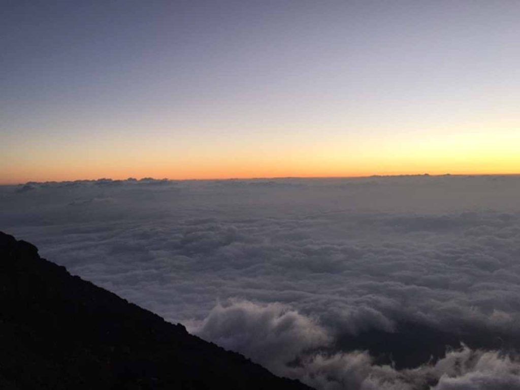 The higher you get, the harder it becomes to breathe, and the more you expend energy. But the views are well worth it. If you manage to climb during good weather, twilight and dawn are stunning. 