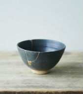 Kintsugi golden pottery repair Image